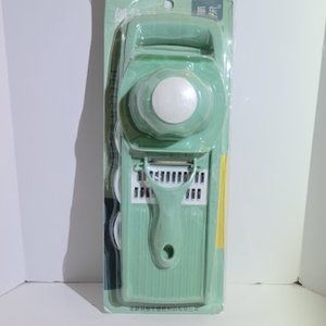 8 PIECE MULTIFUNCTIONAL VEGGIE CUTTER, SLICER, GRATER STAINLESS STEEL BLADES